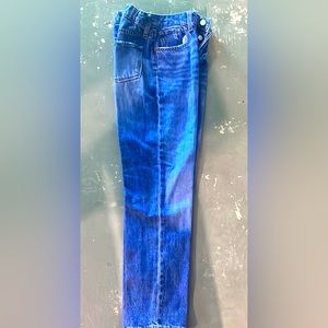 Faded on knee blue jeans